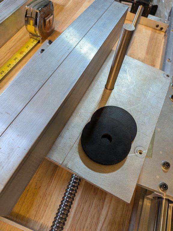 Boom arm main pivot support hole.