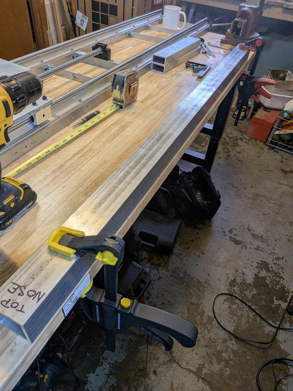 Boom arm main pivot support hole.