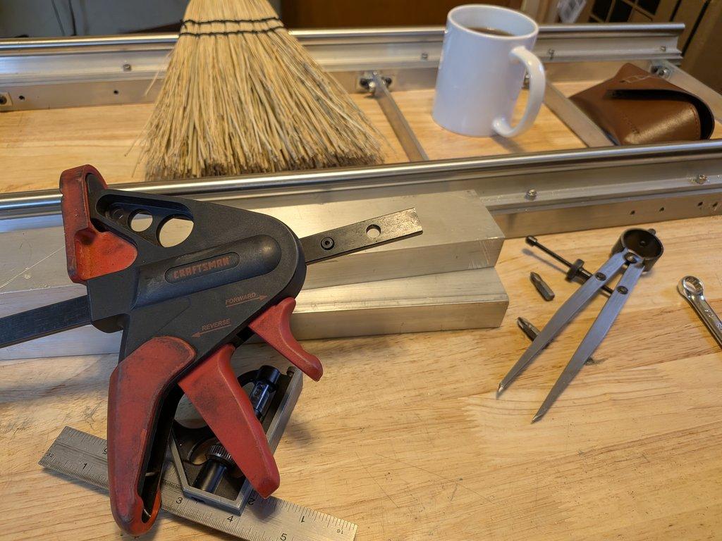 Boom arm main pivot support hole.