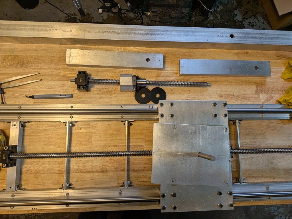 Boom arm main pivot support hole.